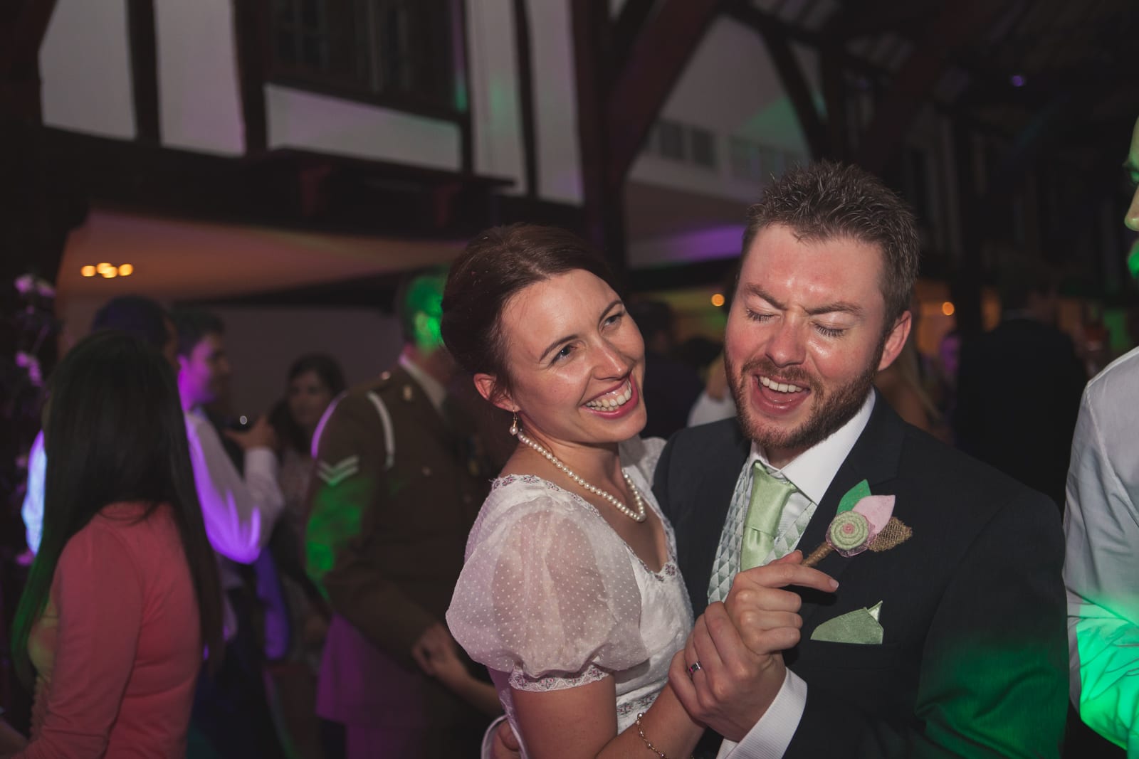 bridebook.co.uk happy bride and groom dancing