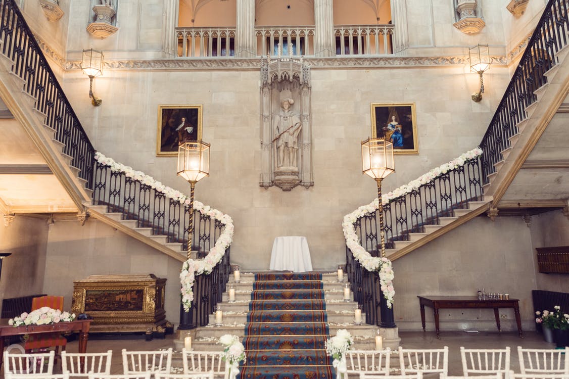 Ashridge House a historic wedding venue, with flowers on the stairs