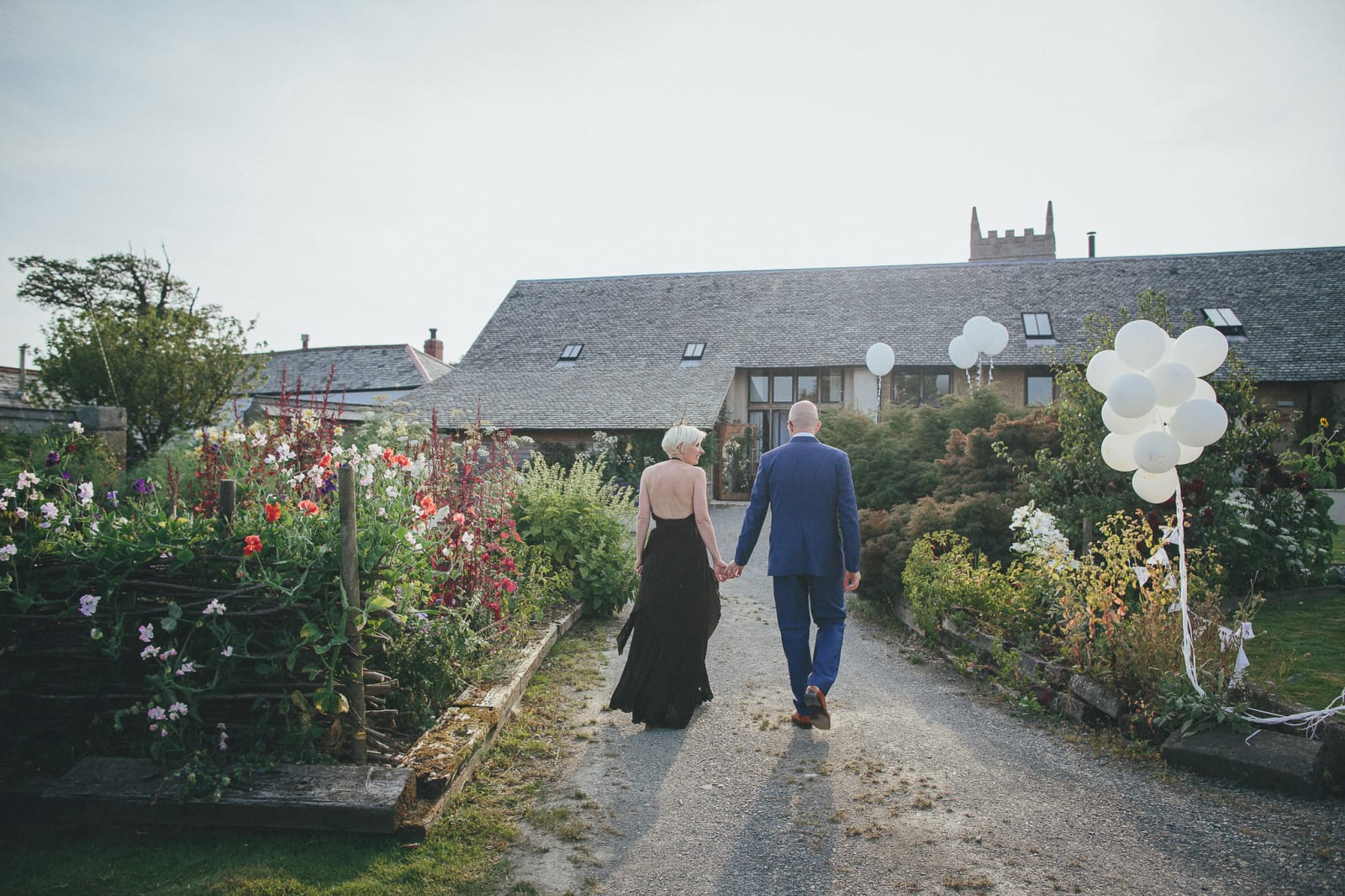 South West | Devon | Hittisleigh | Spring | Boho | DIY | Outdoor | White | Orange | Barn | Real Wedding | Helen Lisk Photography #Bridebook #RealWedding #WeddingIdeas Bridebook.co.uk 