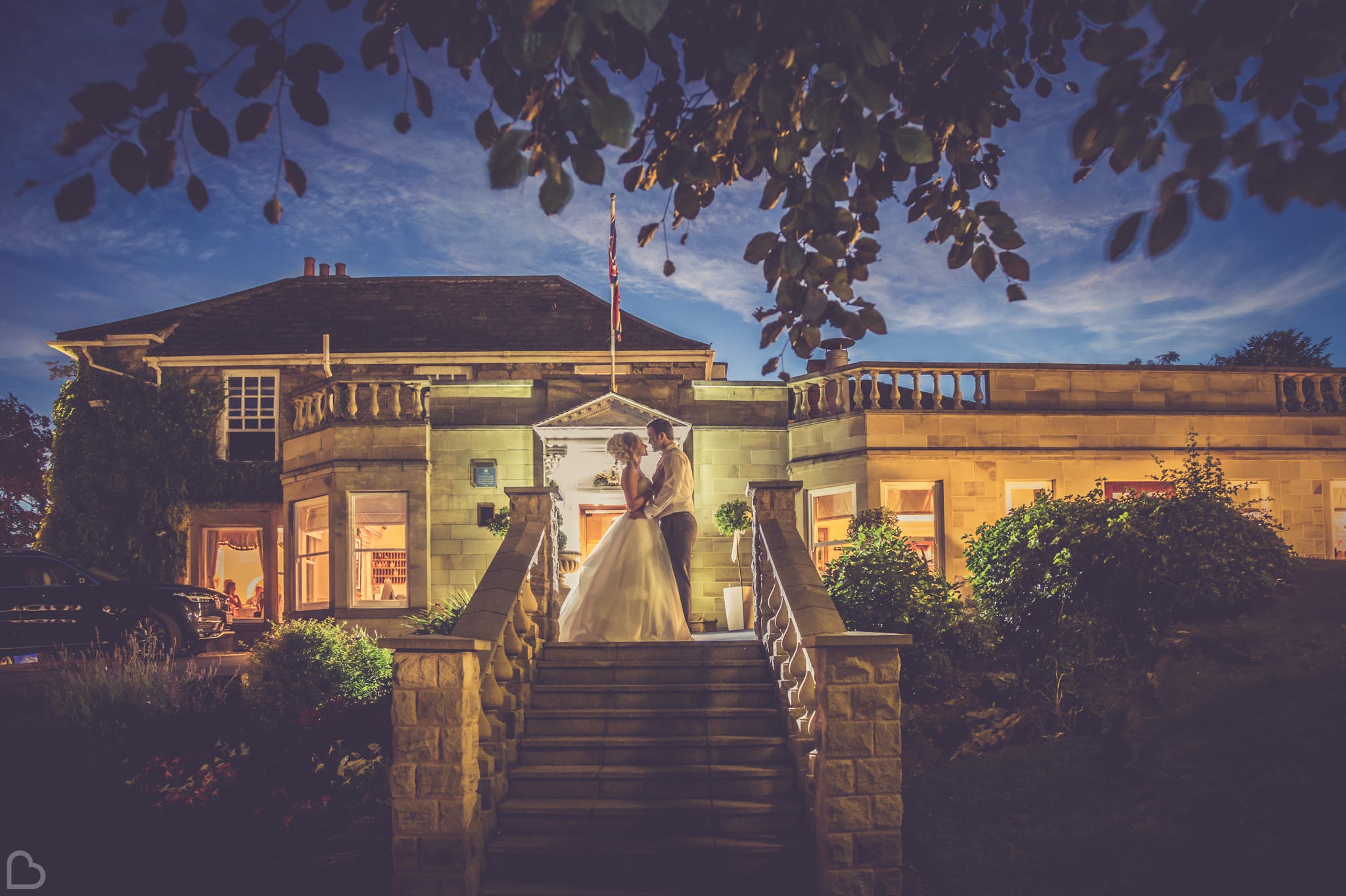 a couple embraces outside wentbridge house hotel