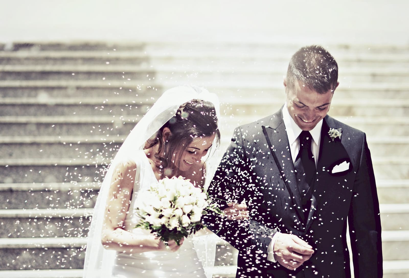 bridebook.co.uk couple showered in rice