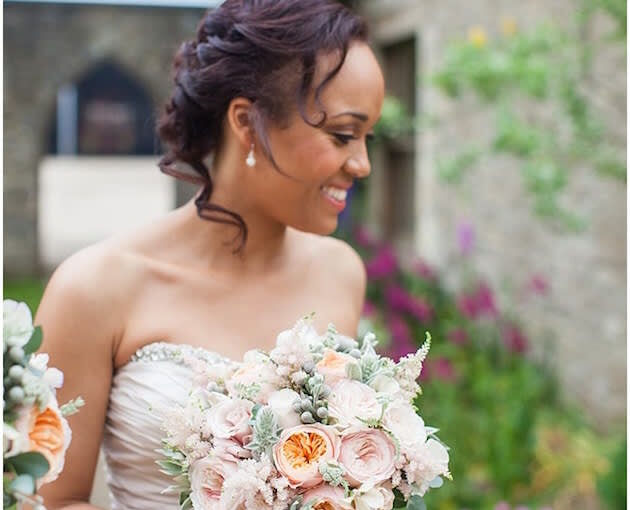 Bridebook.co.uk beautiful bride holding bouquet