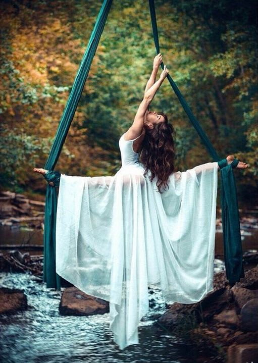 bridebook.co.uk-acrobatic bride above river