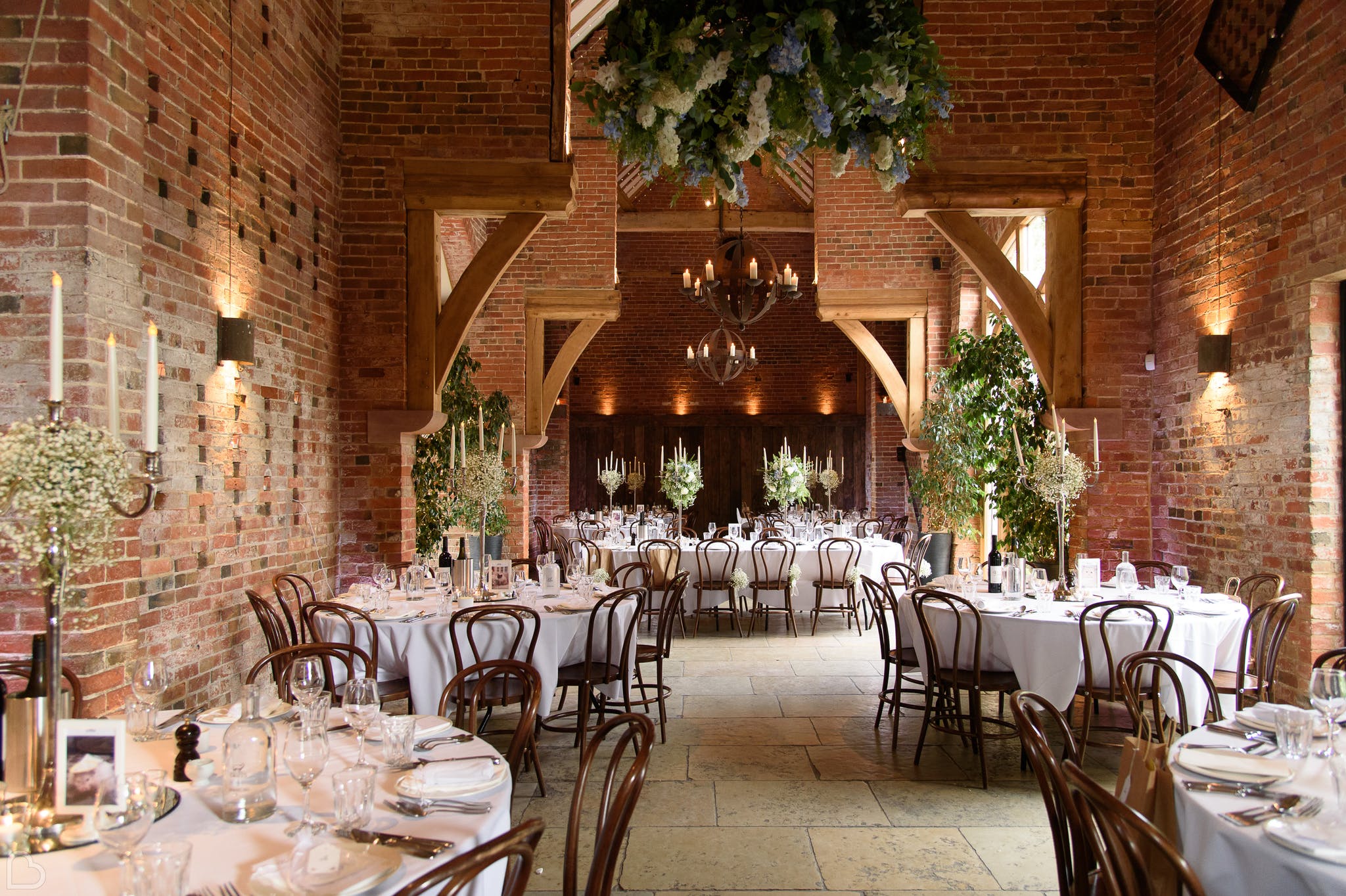 wedding dinner set up at shustoke farm barns in the uk