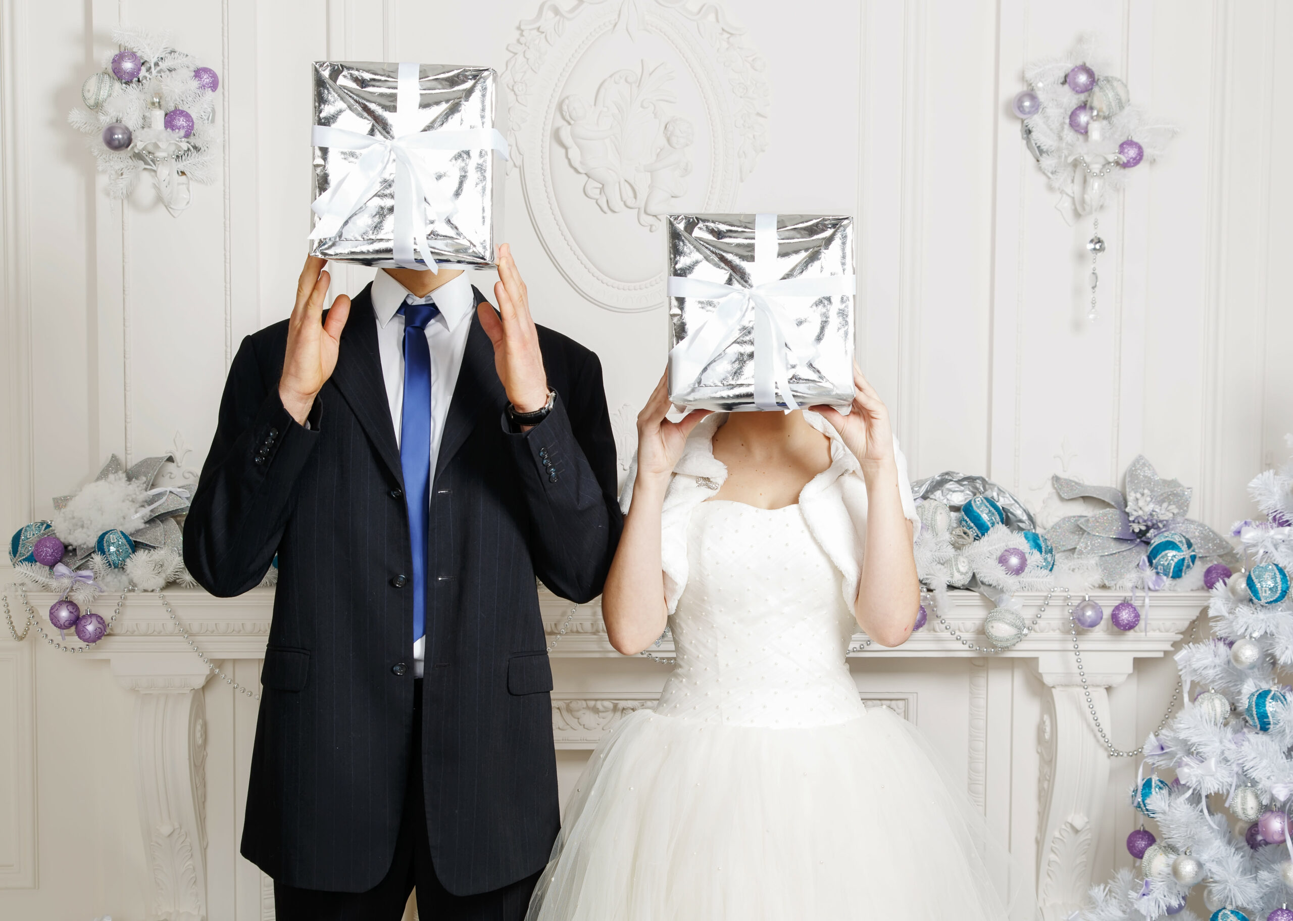 Bridebook.co.uk bride and groom with wedding gifts