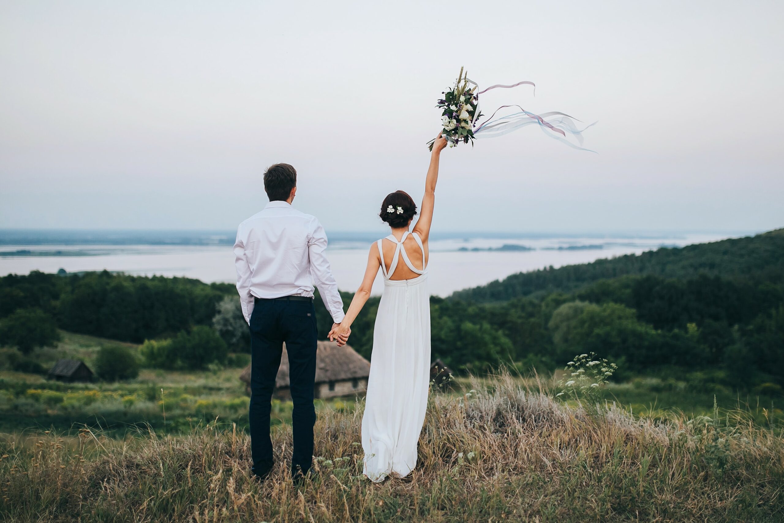 Bridebook.co.uk bride and groom just married scenic photo