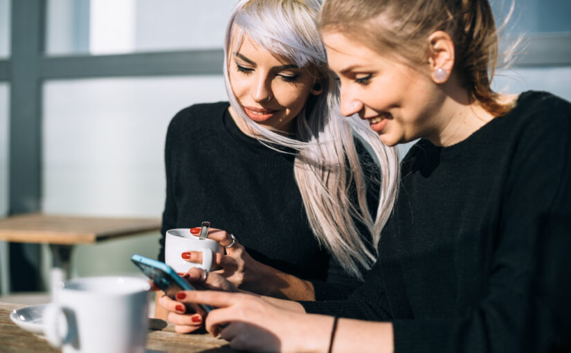 women looking at mobile website