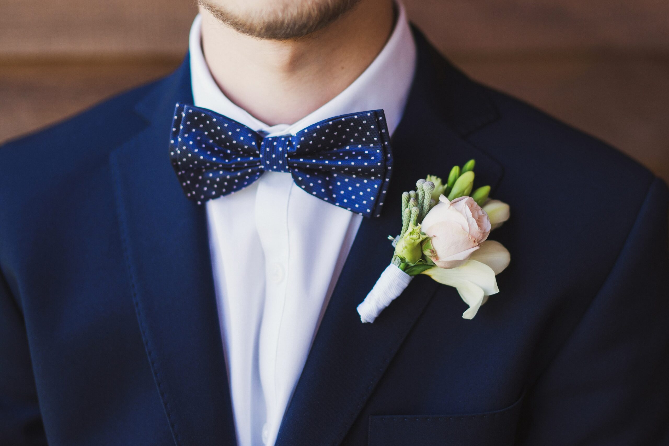 Bridebook.co.uk Groom polkadot blue bowtie